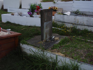 Tom's headstone from 1970.  Over time the base had slipped sideways.