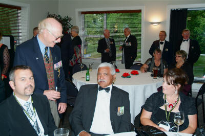 Doug Mackintosh speaking with Danny Campbell 2Pl, Craig and Nicole Beardsley each side [Binning]