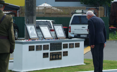 Evan Torrance laying first poppy, bugler WO1 Gary Burt 2Cants [Binning]