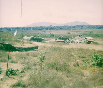 Lang Phouc Hai mountains [Long HAi's] in rear on skyline  [Binning]