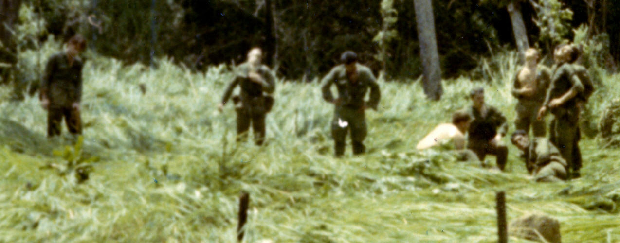 3Pl pad party after Herd is lifted. At right is Dunlea [bare back] and Samson [on side].  Soldier in centre with hands on hips is Sgt Yandall