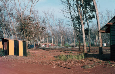 W Coy lines after departure, looking from the back of the old Q Store through the area occupied by the officer accomodation.  The support Coy bar is in the middle background and the Maori arch is missing [Stock]