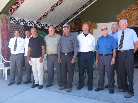 group shot outside the Te Awamaarahi Marae at Tuakau, from left: Bill Rawiri [V5], Ngatoto Kupe, Pompey Marshall [SAS], Ross Dunlea, Danny Campbell, Don Wolff, George Preston, Neil Ure, Evan Torrance [Torrance]
