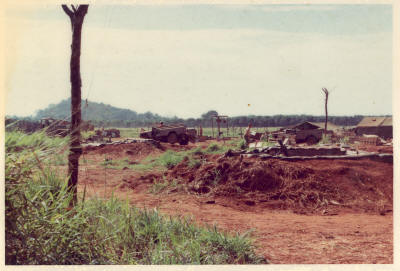 mortar tubes behind emplaced earth walls for protection from SA & ground burst munitions