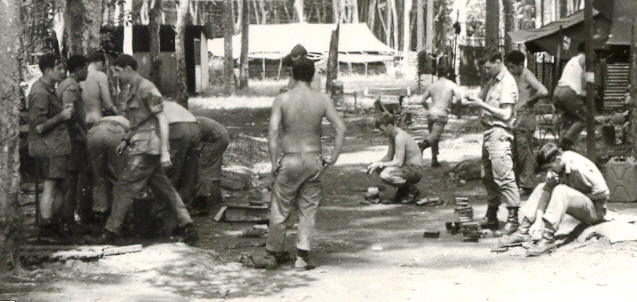 Pre-operation admin in 2Pl  lines at NUI DAT - Lt Upton on left in shorts