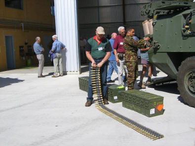 Bruce Young [front], Bob Upton & Fred King [talking rear left] [Cutler]