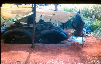 prepared position FSPB Discovery - half round steel culverts were used as overhead protection which was reinforced by further layers of sandbags    [Young]