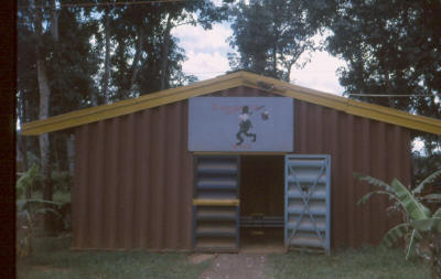 Spt Coy canteen opposite W3 main entrance - known locally as 'Stagger Inn'.  It was the rear of this building that received a faulty mortar flare bomb through the roof missing the barman but destroying large stocks of alcohol  [Young]